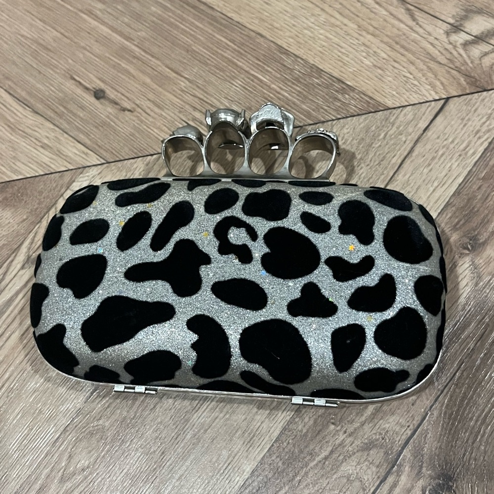 Cheetah print woman’s clutch purse